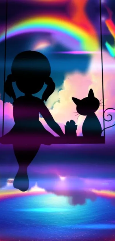 Silhouette of girl and cat on a swing with rainbow background.