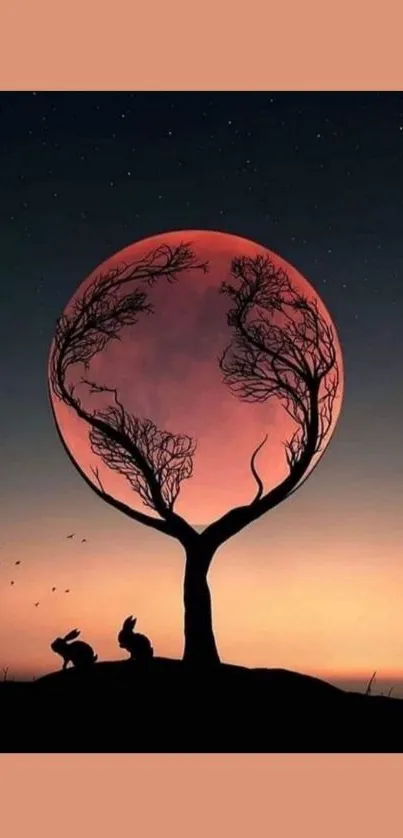 Silhouette of a tree with a large moon in the background and rabbits in the foreground.