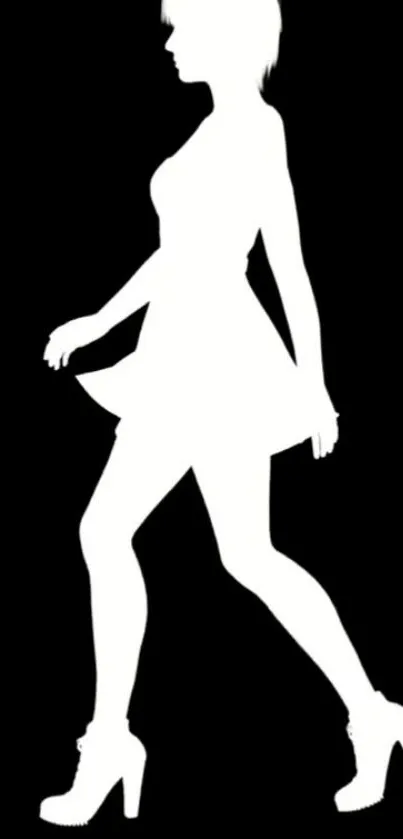 Silhouette of a woman walking on a black background wallpaper.