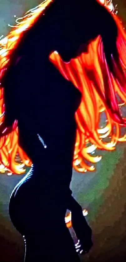 Silhouette with vivid fiery red-orange hair on a mobile wallpaper.