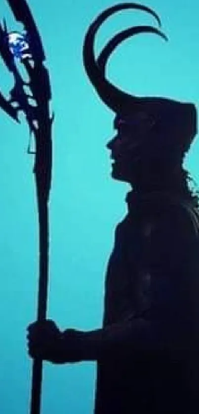 Silhouette with staff against a teal background