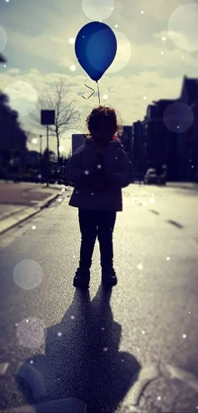 Silhouette of a child with a blue balloon in an urban setting at dusk.