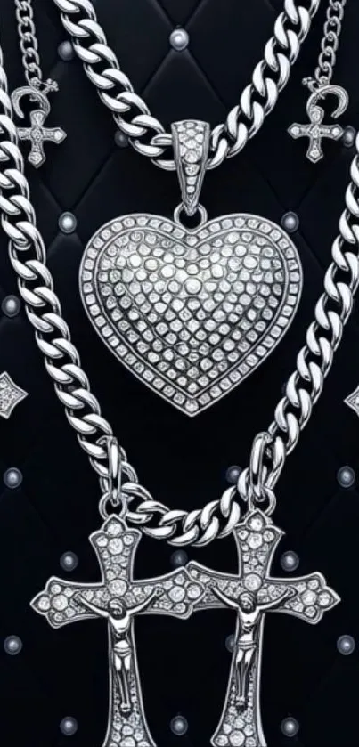 Silver chains with heart and cross pendants on dark background.