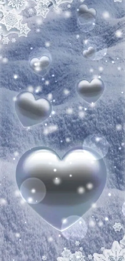 Silver hearts float in a snowy, winter landscape with snowflakes.