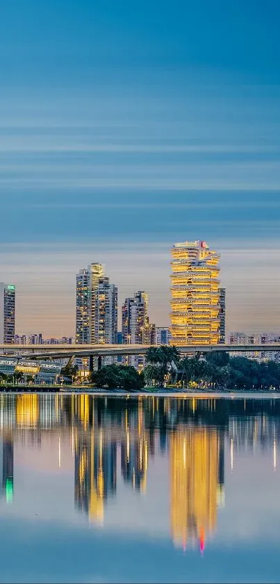 Singapore skyline at night with city reflections on water.