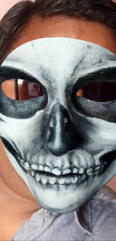 Human face with skeleton mask mobile wallpaper.