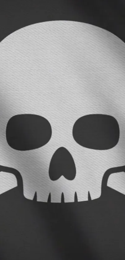 Black and gray skull with crossbones design wallpaper.