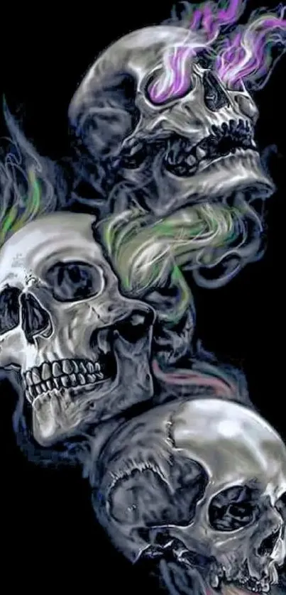 Three skulls with colorful smoke on a black background.