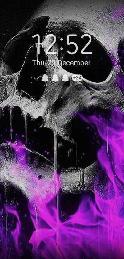 Skull with vibrant purple smoke on dark background wallpaper.