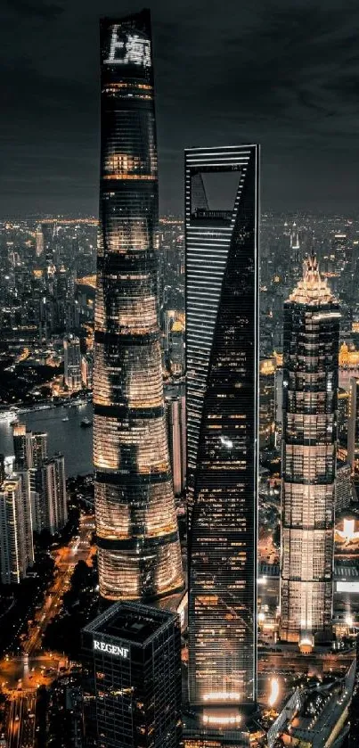 Night cityscape wallpaper with illuminated skyscrapers and a dark skyline.