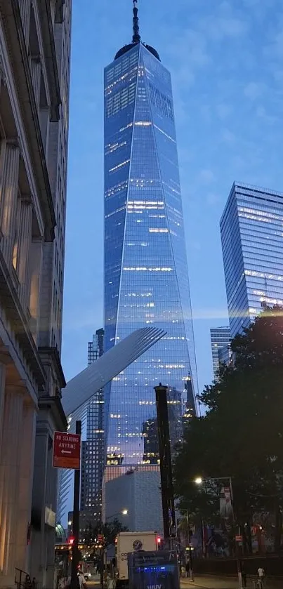 Skyscraper against a blue dusk sky in the city.