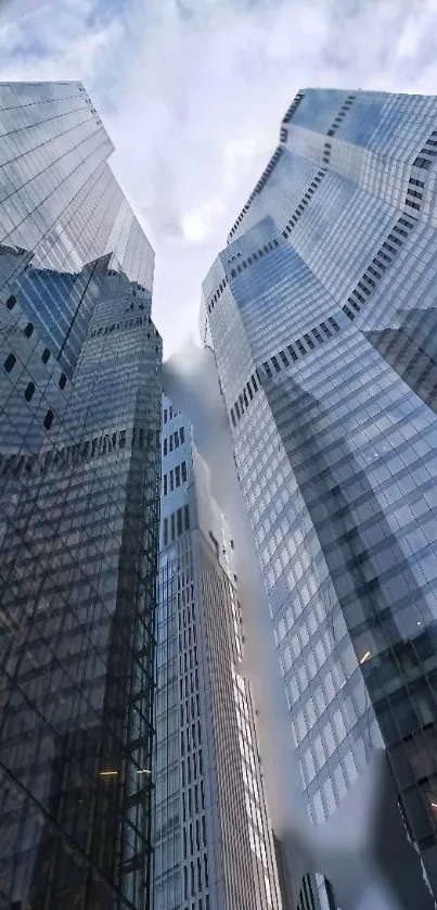 High-rise buildings reflecting the sky in an urban setting, perfect for phone wallpaper.