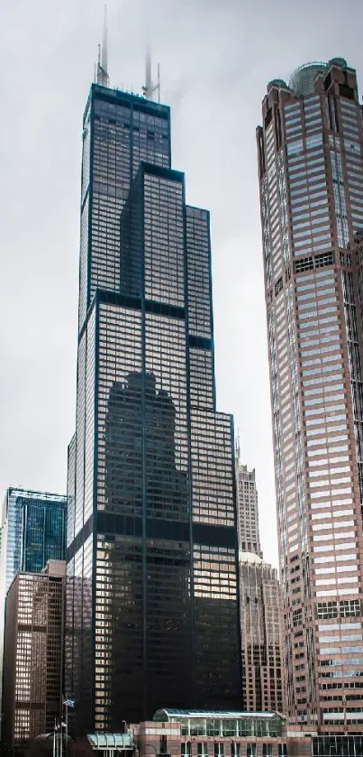 Tall skyscrapers under a cloudy sky.
