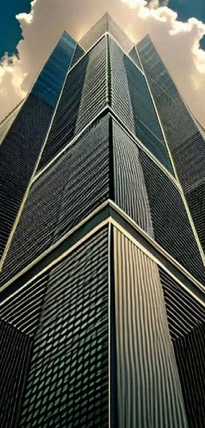 Symmetrical skyscraper with reflective facade against cloudy sky.