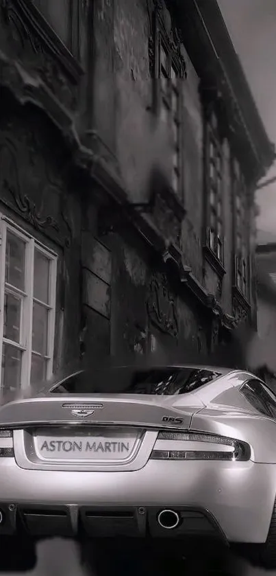 Aston Martin car in a monochrome urban street scene.