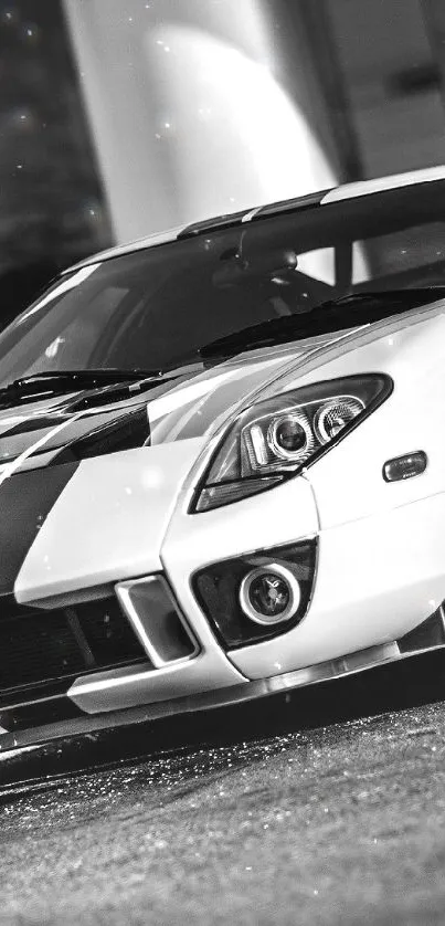 Sleek black and white sports car in a stylish wallpaper.