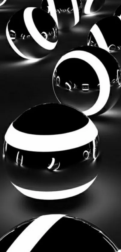 Glossy black spheres with white stripes on a dark background.