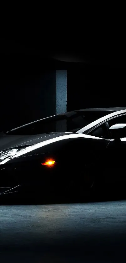 Sleek black sports car parked in a dimly lit garage with moody lighting.