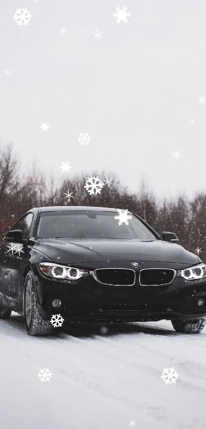 Black car driving through snowy forest landscape.