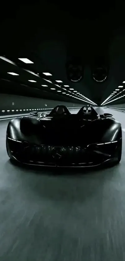 Sleek black sports car racing in an illuminated tunnel.