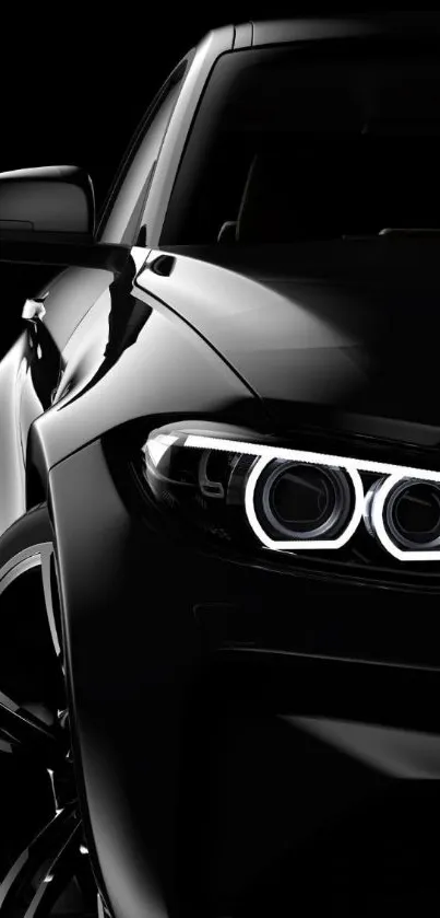 Sleek black car design on mobile wallpaper.