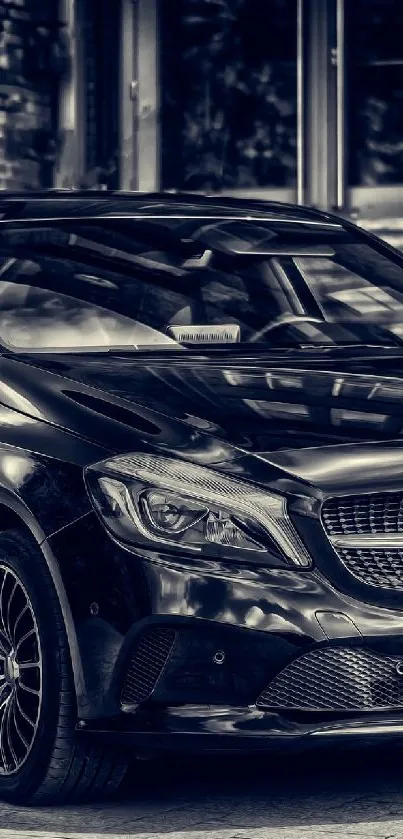 Sleek black car parked in front of elegant architecture, luxury vehicle wallpaper.