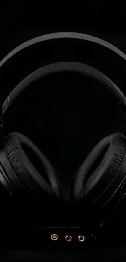 Sleek black headphones with a modern and minimalist design.