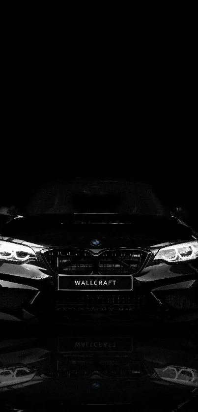 Sleek black luxury car wallpaper for mobile