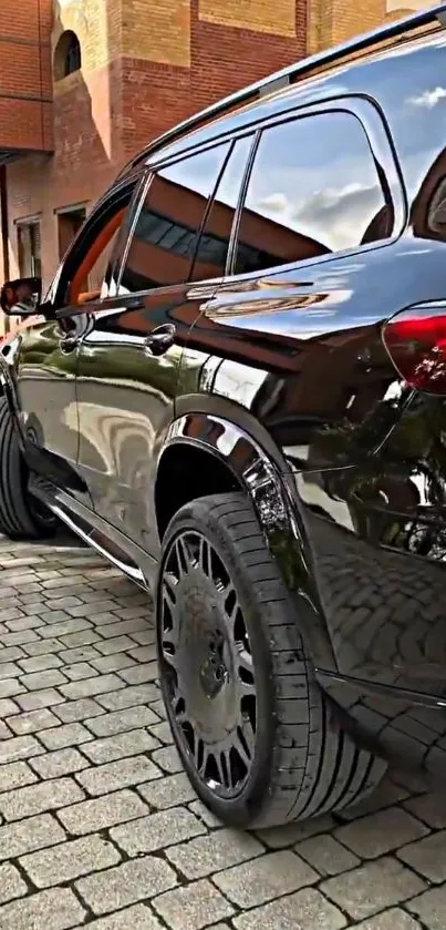 Sleek black SUV parked on urban street.