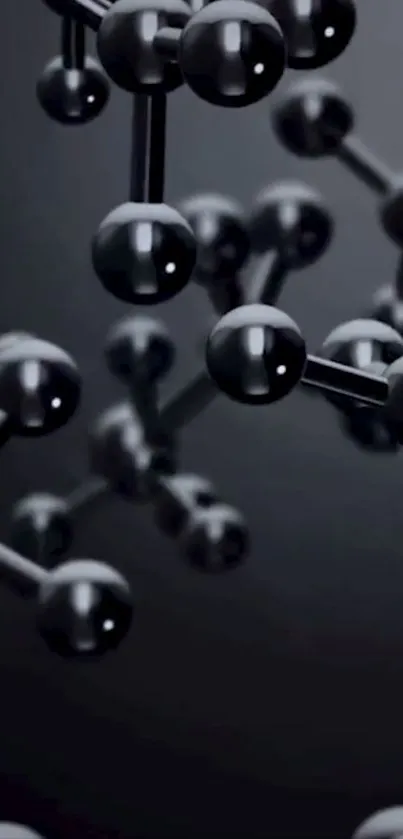 Glossy black molecular structure on a sleek wallpaper background.