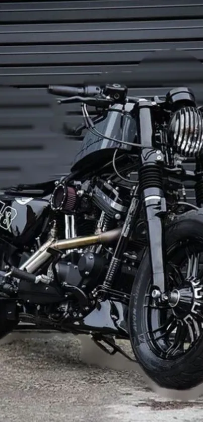 Sleek black motorcycle against a garage backdrop.