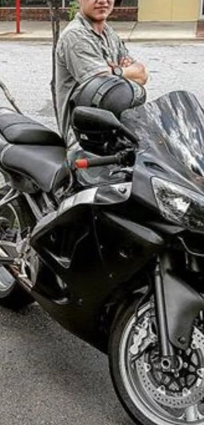 Sleek black motorcycle parked on street in urban setting.