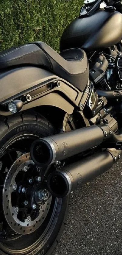 Sleek black motorcycle parked on the road.