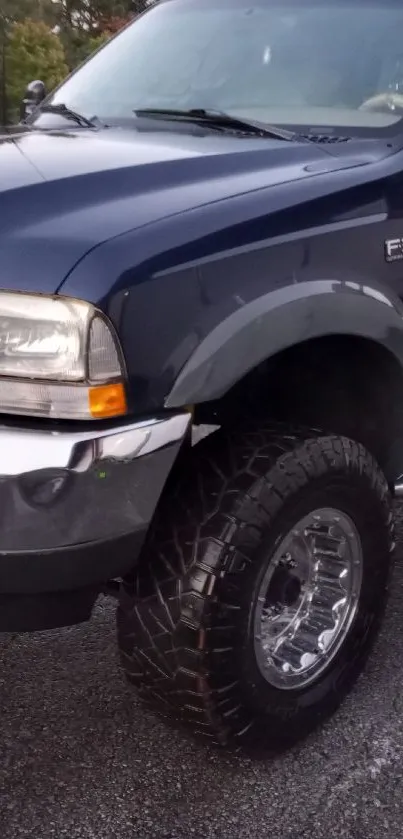 Dark gray pickup truck on the road, exuding powerful style.