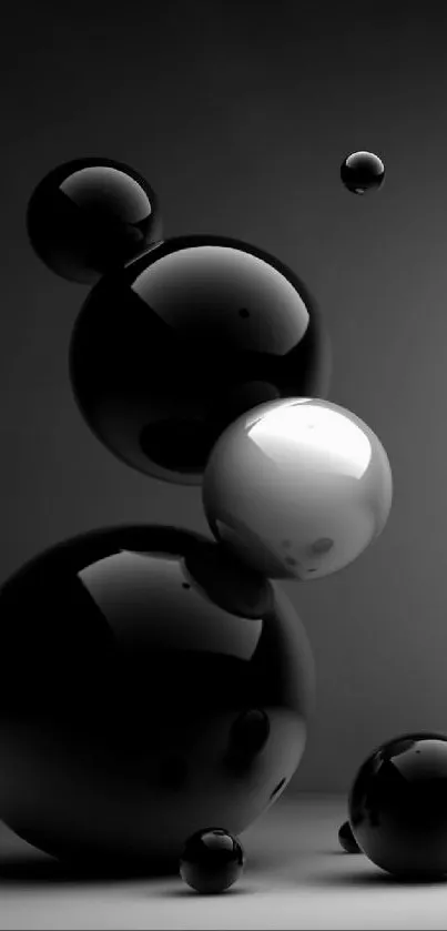 Abstract black spheres on a dark background.