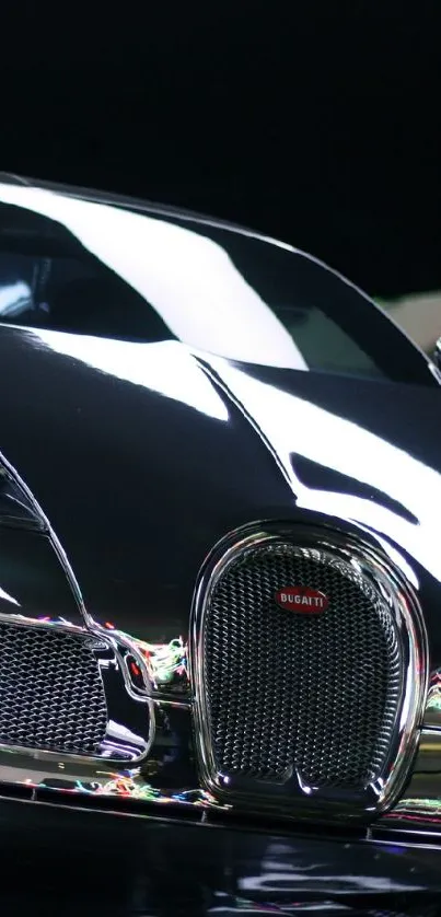 Sleek black sports car with shiny reflections in a modern setting.