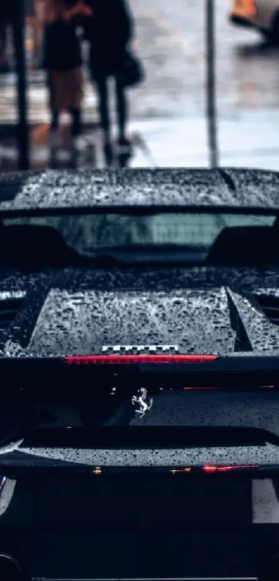 Rear view of a black sports car on a rainy city street.