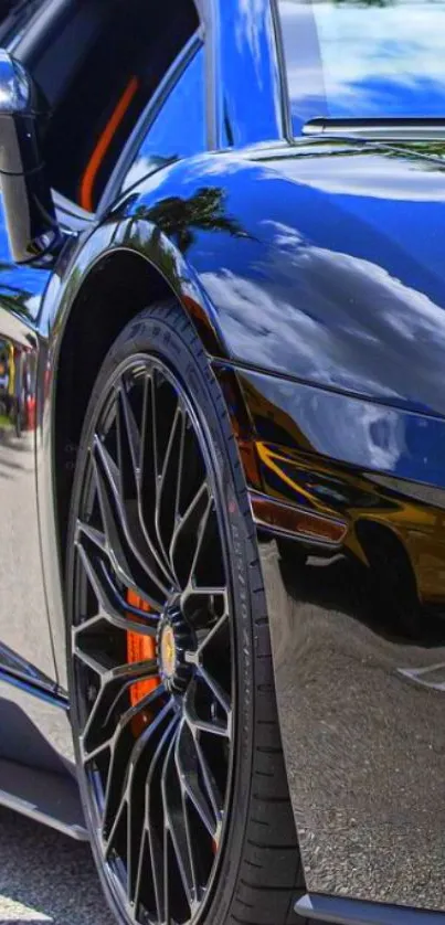 Sleek black sports car with glossy reflections, perfect for mobile wallpaper.