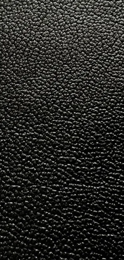 Sleek, black textured mobile wallpaper, minimal design.