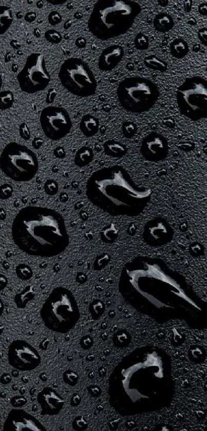 Close-up of water droplets on a black surface for phone wallpaper.