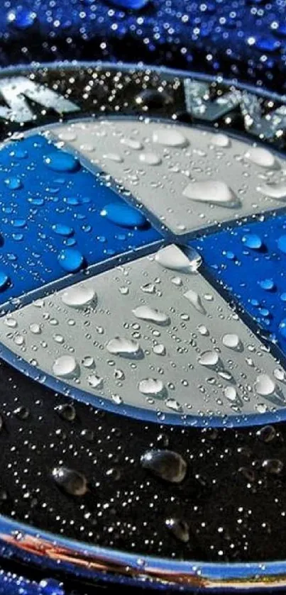 Sleek blue automotive logo with water droplets.