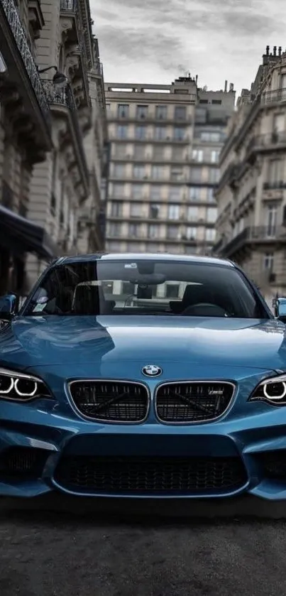 Blue sports car on a historic street.