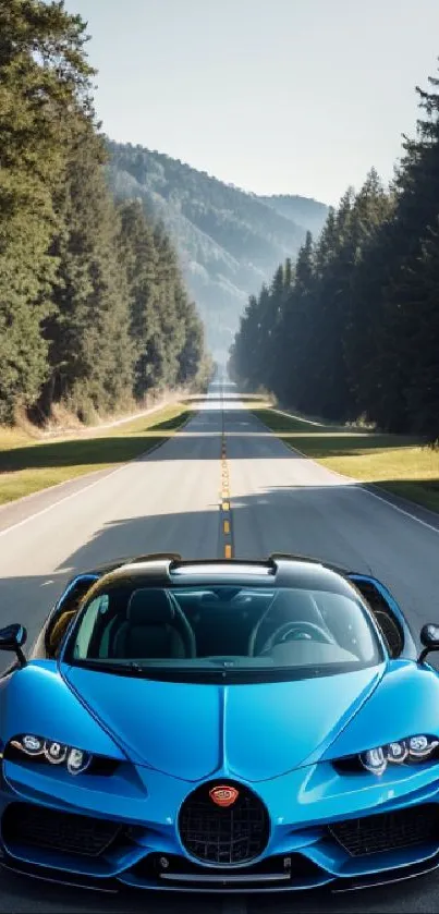 A blue sports car on a scenic highway lined with trees.