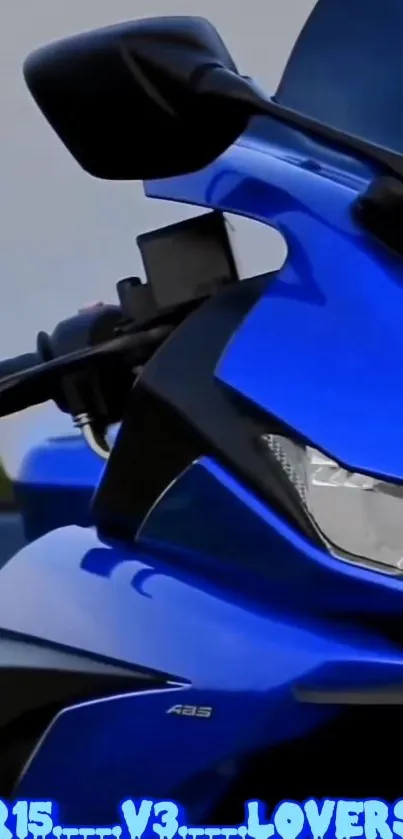 Close-up of sleek blue motorcycle design.