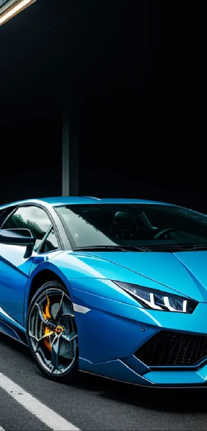 Sleek blue sports car under streetlights wallpaper with a modern and luxurious design.