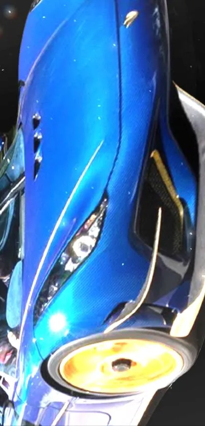 Electric blue sports car on black background wallpaper.
