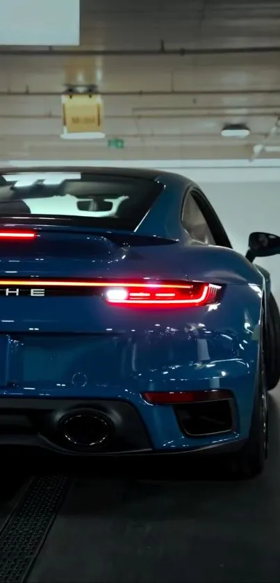 Sleek blue sports car in a modern garage setting.