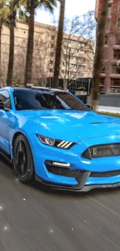 Vibrant blue sports car driving down a city street with skyscrapers in the background.