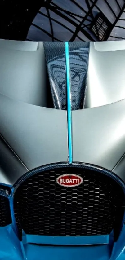 Sleek Bugatti car hood with dynamic blue accents.