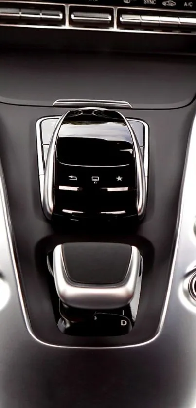 Sleek car control panel with metallic design details.